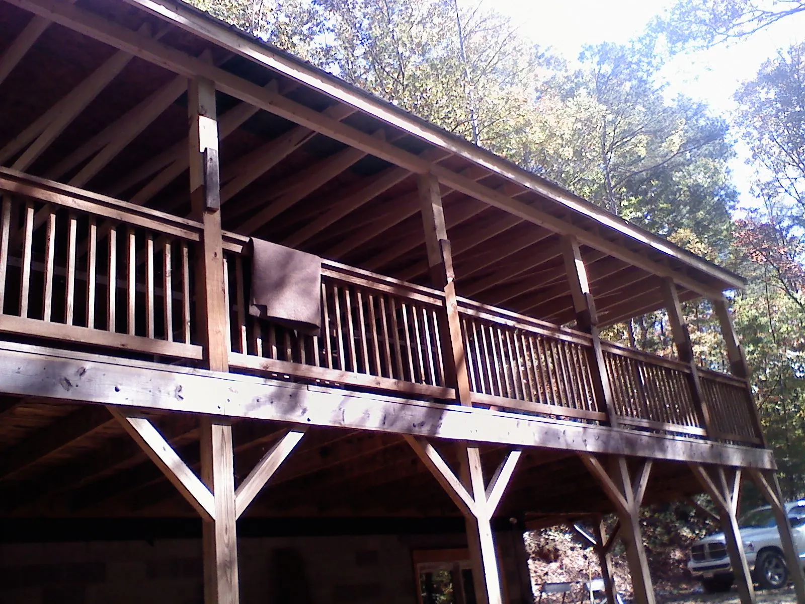 Timber framing under a new elevated porch and deck — Roof Leak Repair in Cambridge City by Roofing Brothers